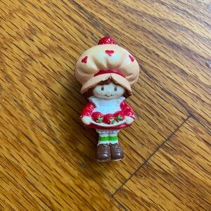 Vintage Strawberry Shortcake Figurine with Red and Brown Accents